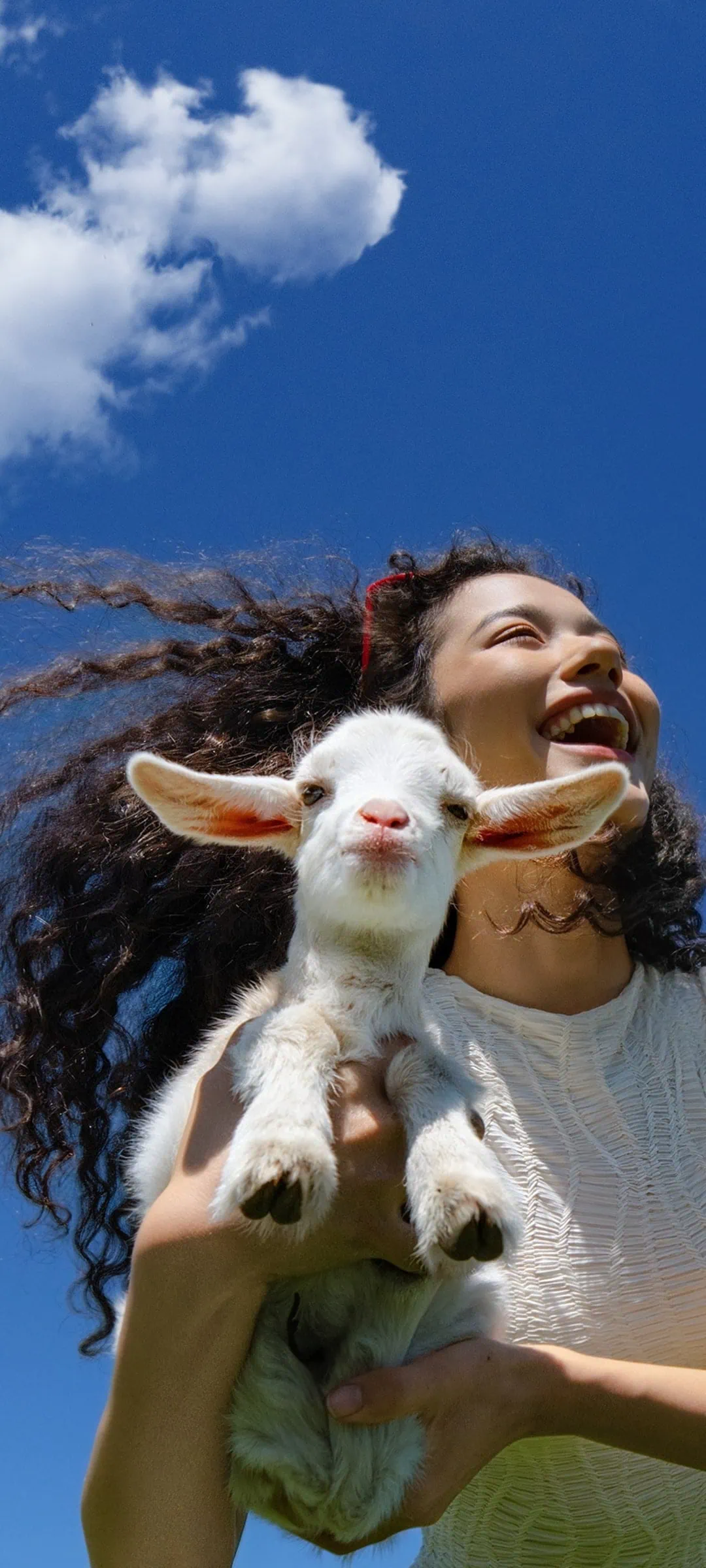 OxygenOS 16 Wallpapers women with goat